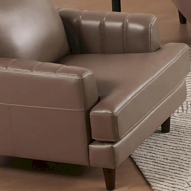 Fauteuil en cuir pleine fleur avec plumes, mousse à mémoire de forme et ressorts