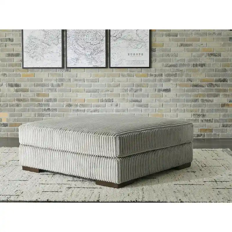 Canapé d'angle avec pouf - 133 L x 133 P x 38 H